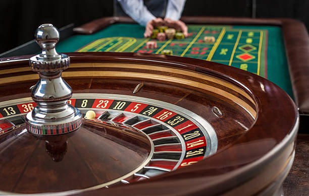 Golden Toad slot game interface on mobile phone screen with spin button and balance display
